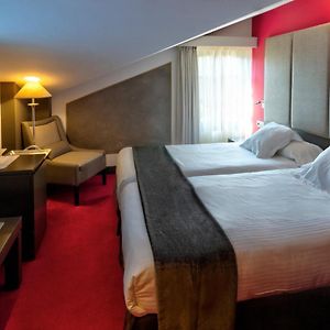 Habitación Confort con Cama Queen